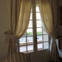 Decors de fenetres pique ecru casal embrasses sur mesures